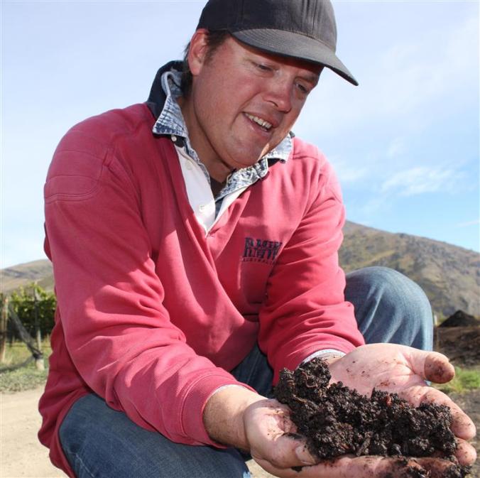 viticulturist_james_dicey_holds_worm_made_fertilis_56fcf7ae4d